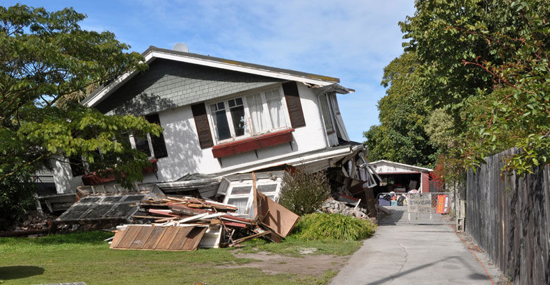 A house badly damaged by a disaster